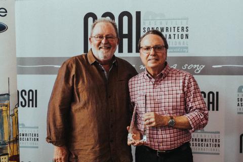 NSAI President of the Board Steve Bogard with NSAI Champion Award Recipient Jody Williams